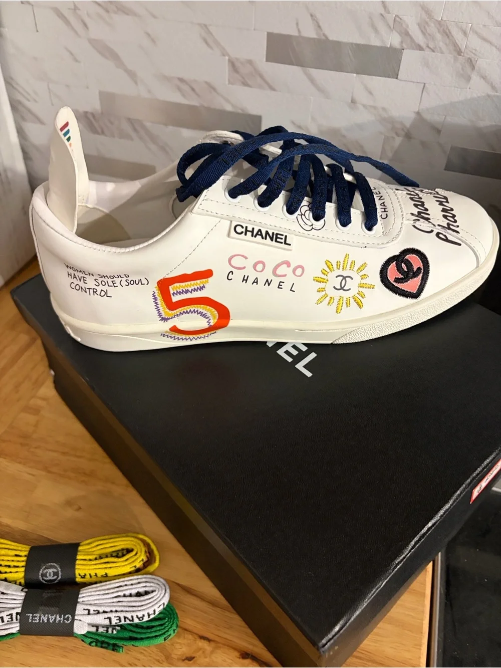 CHANEL White Kids Sneakers with Red and Navy Graphic Accents
